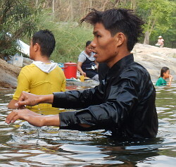 river hiking fully clothed